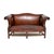 A stunning antique leather hump back sofa in the Chippendale style, made in England and likely dating from around the...