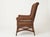 An exceptional, highly collectible find for enthusiasts of fine American craftsmanship, this Antique Wicker and Rattan...