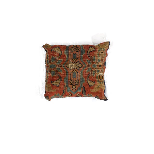Pillow with handmade antique Persian rug fragment. Poly fill, fabric backing with sewn closure.