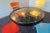 A striking and substantial mid-century modern outdoor bistro set dating to the 1950s–1960s. This set features four heavy-...