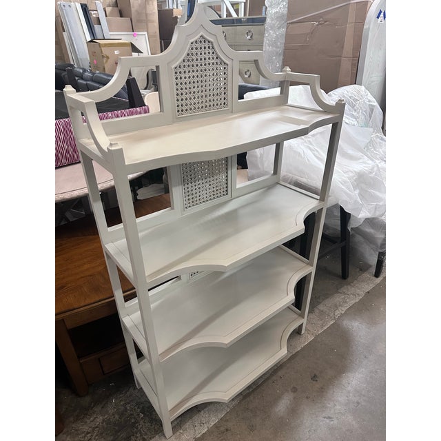 Four shelves and full of style! Beautiful Chippendale like aesthetic with a classic vintage style. We love the top ornate...