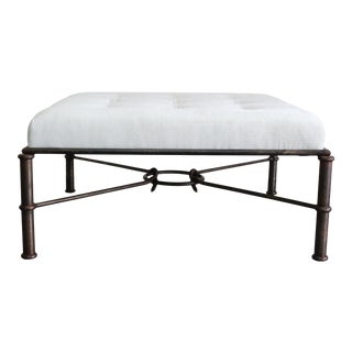 Mid Century Iron Ottoman Newly Upholstered in a Cream Chenille Textile For Sale