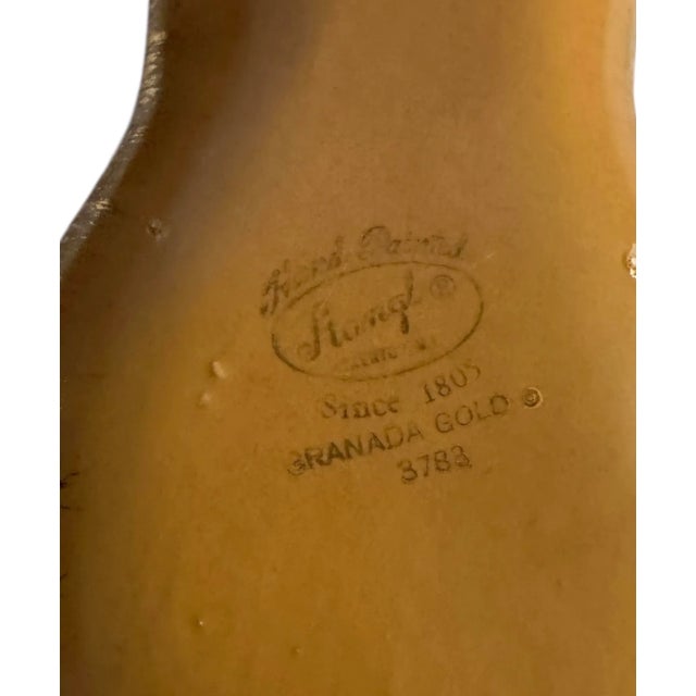 This is a vintage ceramic dish from Stangl Pottery, known for its quality ceramics. It features a pear shape and is part...