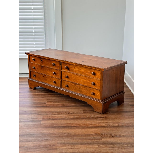 This rare chest is as versatile as it is storied, serving as storage, a coffee table, or a bench, while carrying with it a...