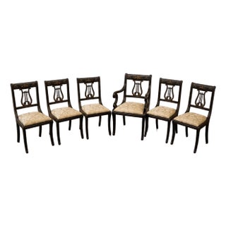 Set of Six Regency Style Ebonized and Parcel-Gilt Lyre Back Dining Chairs For Sale