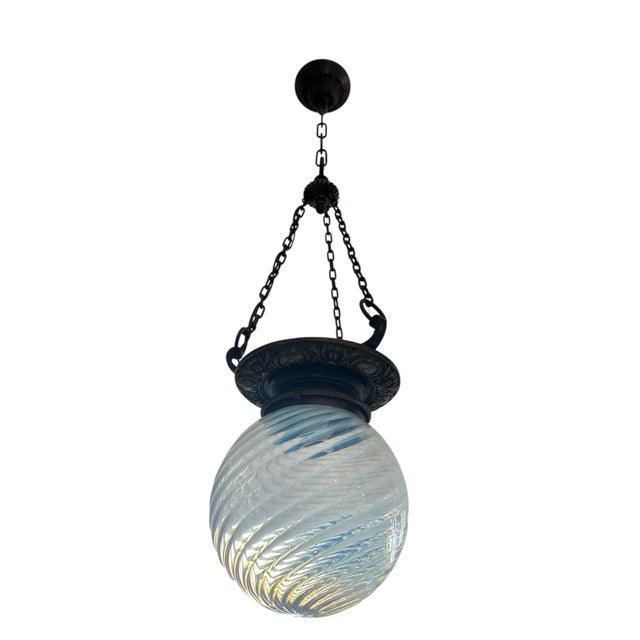 This must go in your entry way! The large Phoenix swirl glass is so charming on an embossed brass holder with three chains...