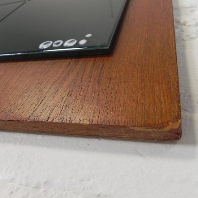 10 tiles (15.3 x 15.3 cm) together form an image of a horse and a moon. Height: 90 cm. Width: 40 cm. Depth: 2 cm. Origin:...