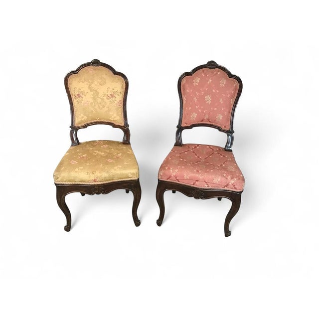 A refined set of 5 Baroque dining chairs from Germany, crafted from solid walnut. Each chair features an intricately...