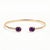 Add a touch of timeless elegance to your jewelry collection with this beautifully crafted Oval Amethyst Open Cuff...