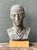 Inspired by the enduring beauty of ancient Greek sculpture, this vintage Classical Greek style plaster bust is a refined...