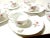 Dainty shell shaped plates with matching cups. These are ceramic made in the 1940s in Japan. They are cream colored with...