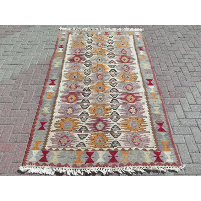 This beautiful rug is from southern Turkey Antalya. About 60 years old. It is handmade with pure wool on cotton fringes...