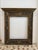 Lombard frame from the early 16th century with a denticulated tympanum in carved, lacquered, and gilded wood with inserts...