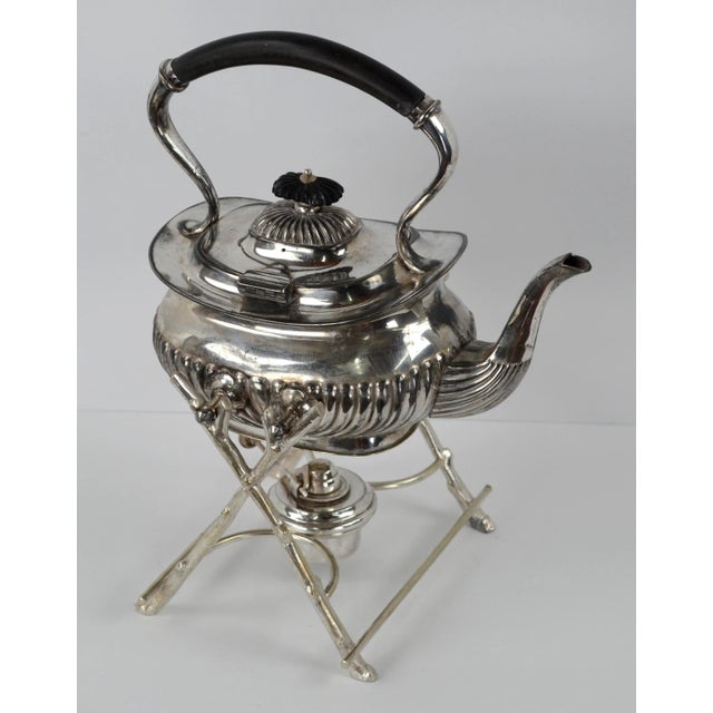 Early 20th Century Edwardian tilting silver-plated teapot on stand with warmer, also known as a spirit kettle, by...