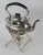 Early 20th Century Edwardian tilting silver-plated teapot on stand with warmer, also known as a spirit kettle, by...