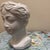 This contemporary ceramic planter updates classical aesthetics for modern interiors. It features a stylized female bust...