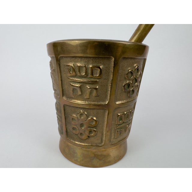 Large and heavy solid bronze mortar and pestle, produced in Europe circa 1950–1970. This impressive piece features cast...