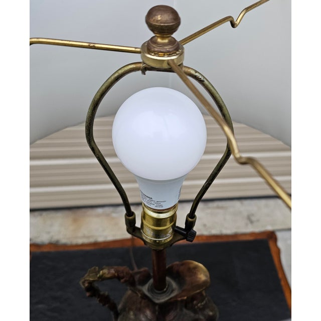 Featured is a Vintage Tony Paul for Westwood Industries Patinated Bronze Urn Form and Marble Lamp. Illuminate your space...