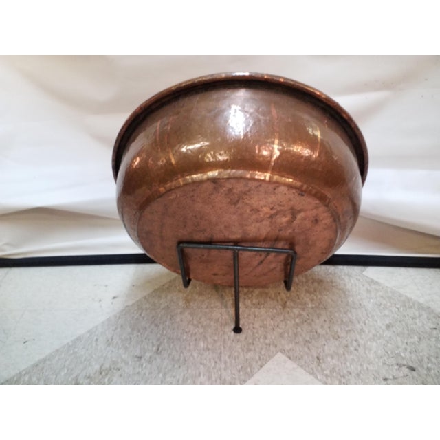 Striking antique copper bowl with wrought iron stand was possibly used for cooking . Fabulous condition..