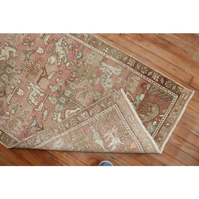 Make a bold statement in a hallway with this mid-20th-century tribal Persian runner featuring a folksy motif on a soft...
