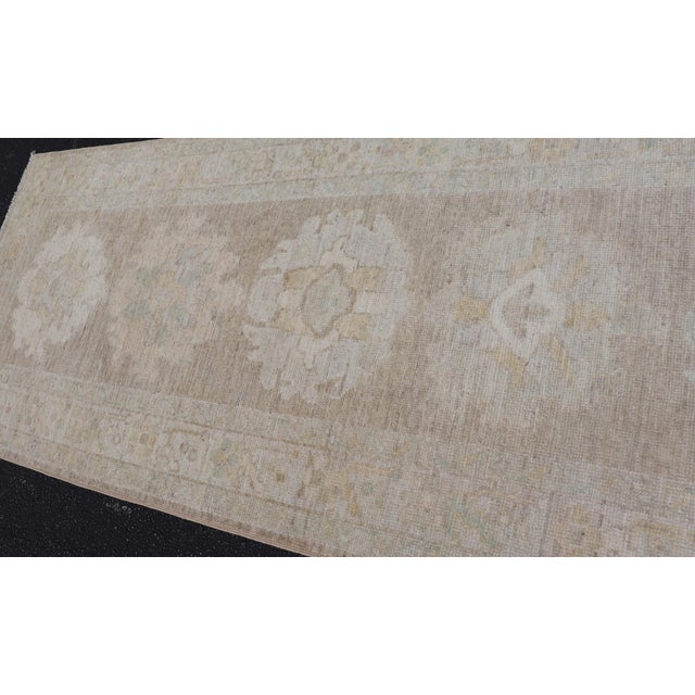 Sand Long Soft Oushak Runner With Sand Field and Pale Green and Blue Accents For Sale - Image 8 of 12