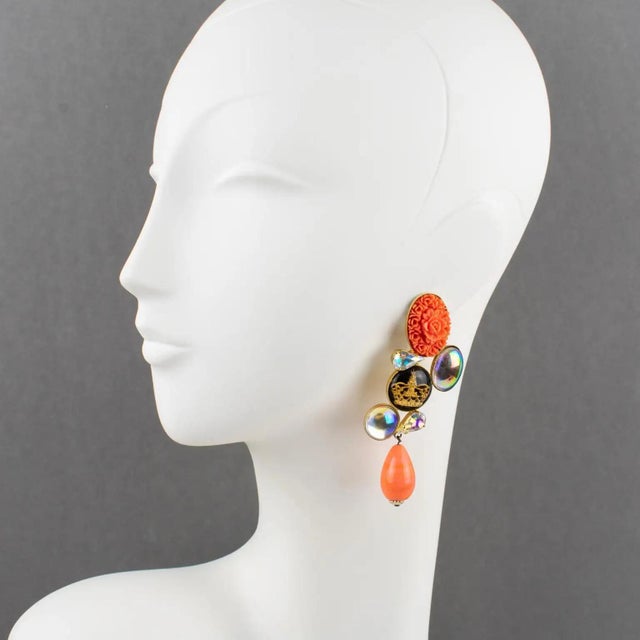 These romantic French designer Zoe Coste clip-on earrings boast a dangling shape with baroque style with a gilt metal...