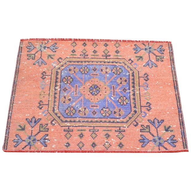 Hand-knotted with care using traditional rug-making techniques, this wool rug blends timeless craftsmanship with a modern...