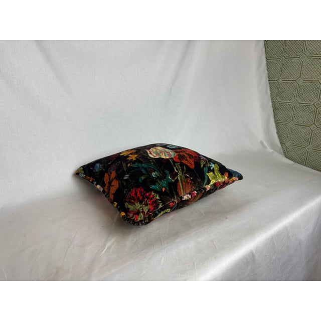 One gorgeous accent pillow. The bright colors appear so rich and vibrant atop the warm brown background. This would bring...