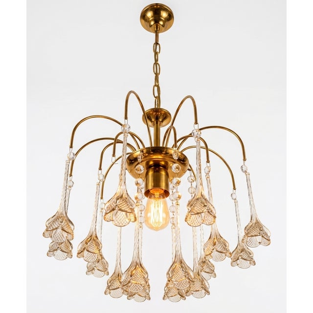 A beautiful art deco chandelier from 1966, which we venetians call the "rain chandelier" due to the shape of its frame,...
