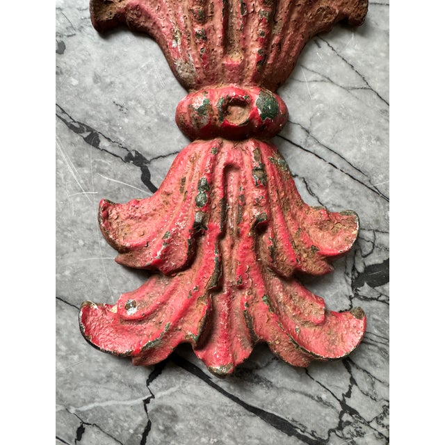 Heavy antique cast iron architectural/decorative fragment. Chippy red paint provides so much character. Would be a unique...