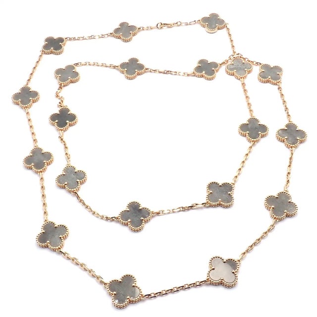 Van Cleef & Arpels 18k Rose Gold 20 Motif Alhambra Obsidian Necklace. The necklace is accompanied by a Van Cleef & Arpels...
