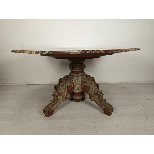 Antique table with carved solid oak base. Octagonal marble top