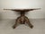Antique table with carved solid oak base. Octagonal marble top
