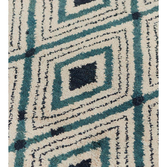 Part of the Mansour Modern collection, this wool rug is handwoven by master weavers using the highest quality techniques...