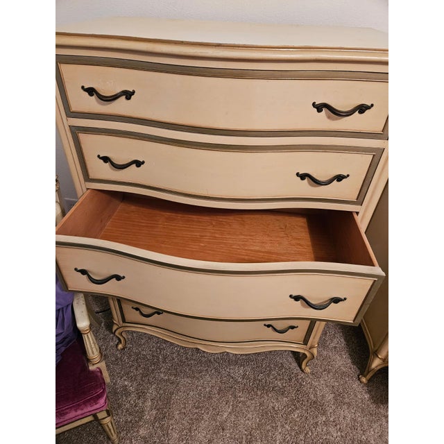 My mother recently passed away, and my sister and I are looking for the right new home for her beautiful vintage Drexel...
