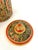 Beautiful set of three Italian ceramic lidded canisters in an all-over ornate floral design with figural flower handle on...