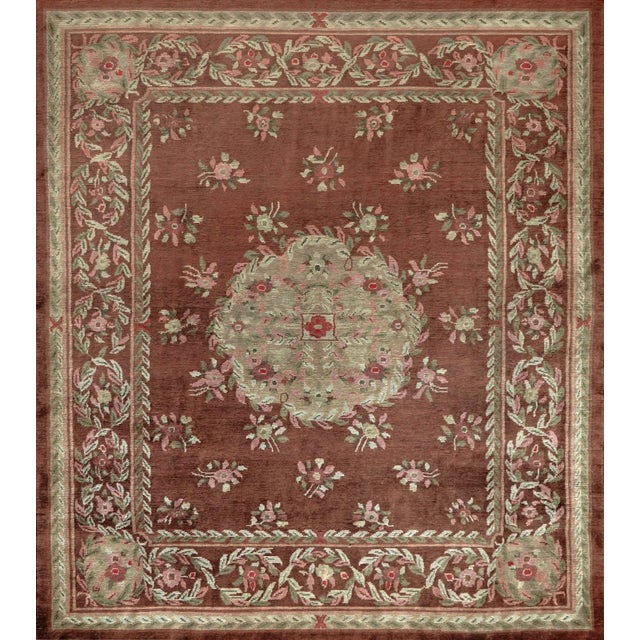 High quality rug handwoven in Kashmir. This decorative rug features the classical French Savonnerie design. 100% fine...