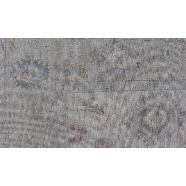 Large Oushak Rug With Floral Motifs & Muted Colorful Tones on Neutral Background For Sale - Image 10 of 12