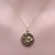 This is a precious 14k gold medallion vintage charm. It is handcrafted and molded from a Victorian-era button and features...