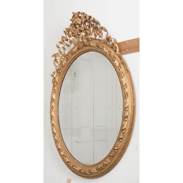 French 19th Century Louis XVI Oval Gilt Mirror For Sale - Image 4 of 9