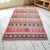 Originating from the Aegean region of Anatolia, this striking 1960s vintage Balikesir kilim is a remarkable example of...