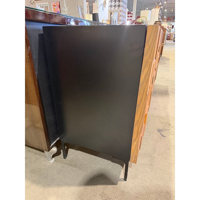 A bold and sculptural statement, this Brutalist-style “Staccato” walnut sideboard captures the raw artistry and...