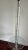 Mid century modern stacked Lucite column floor lamp with a glass table.
