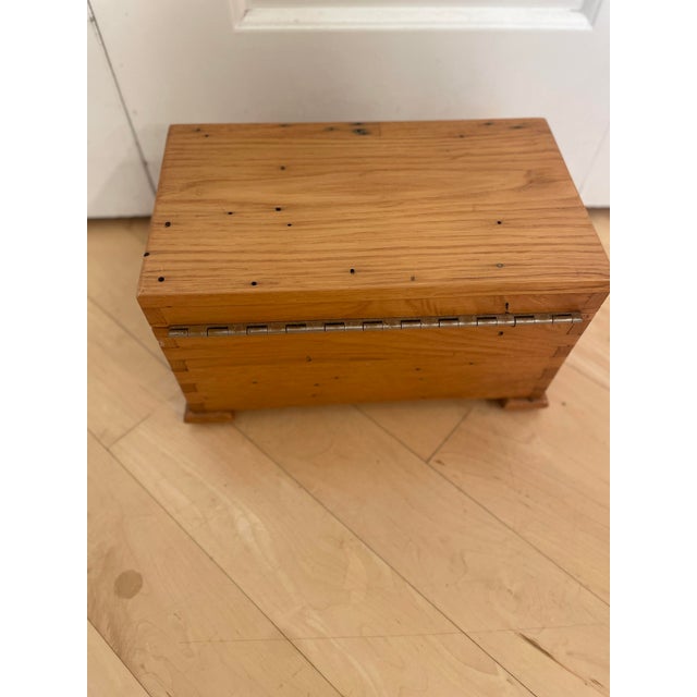 The product is a small rustic vintage wooden desk dresser top with dovetail joinery, perfect for use for stylish storage....