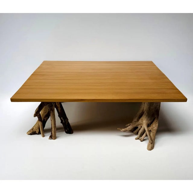 Low table with a refinished cedar top and driftwood base. The cedar has a warm honey tone and subtle grain, while the base...