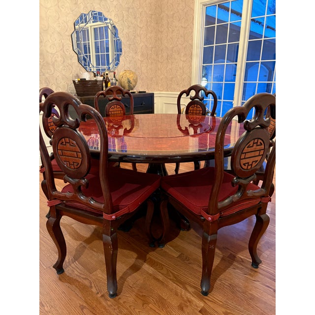 This substantial custom dining set, crafted in Bangkok in the 1980s, blends traditional Asian design elements with a clean...