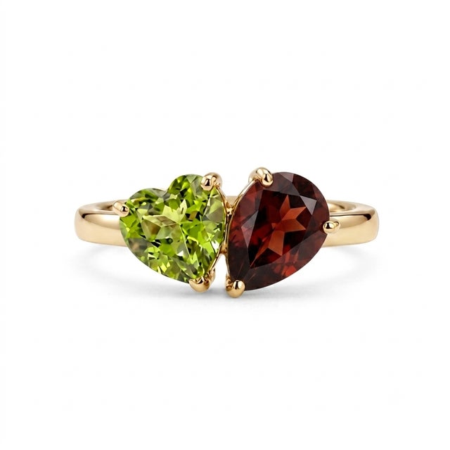 Celebrate harmony and elegance with this beautifully crafted two-stone gemstone ring, featuring a vibrant 5mm heart-cut...
