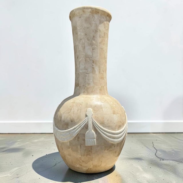 Beautiful postmodern tessellated stone vase with contemporary ribbon design around the entire piece. The polished stone...