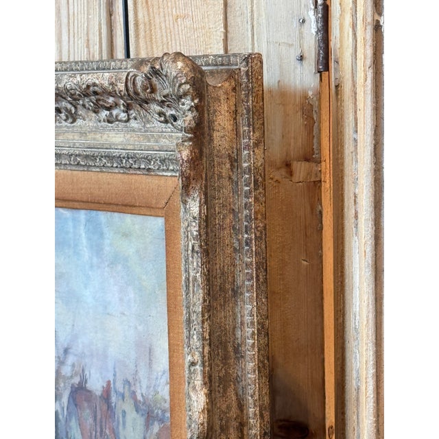 Mid-20th century French oil on canvas by George René Sinicki depicting a quiet village with church spire and red-roofed...