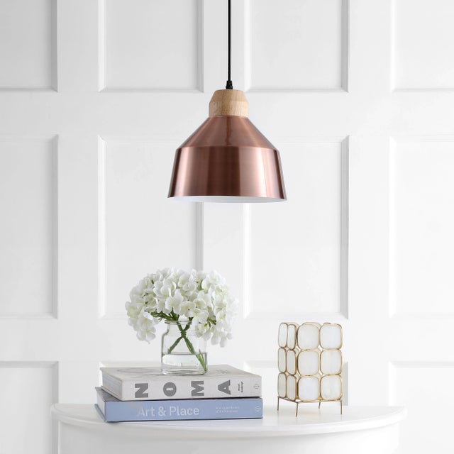 Bring industrial chic style to any bedroom, living room, or kitchen with this modern pendant. Crafted with a shiny copper...